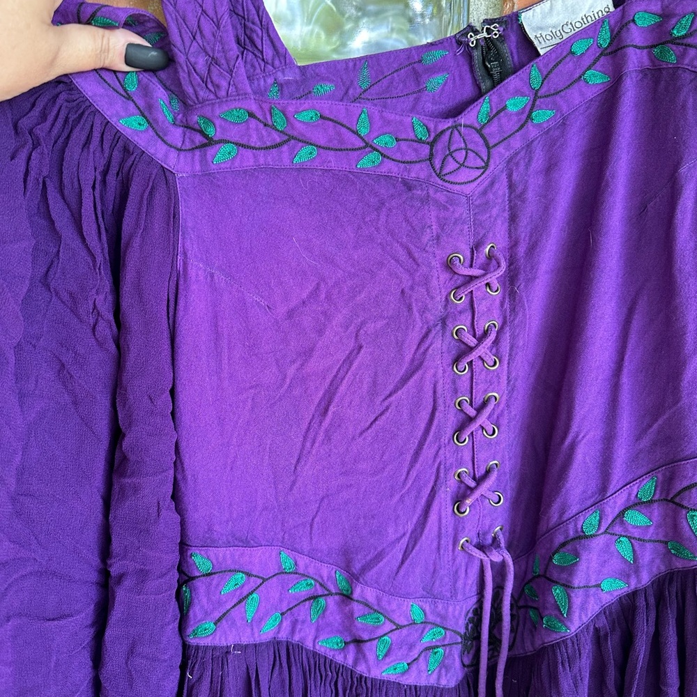 Vibrant Purple Dress with Green Leaf Details